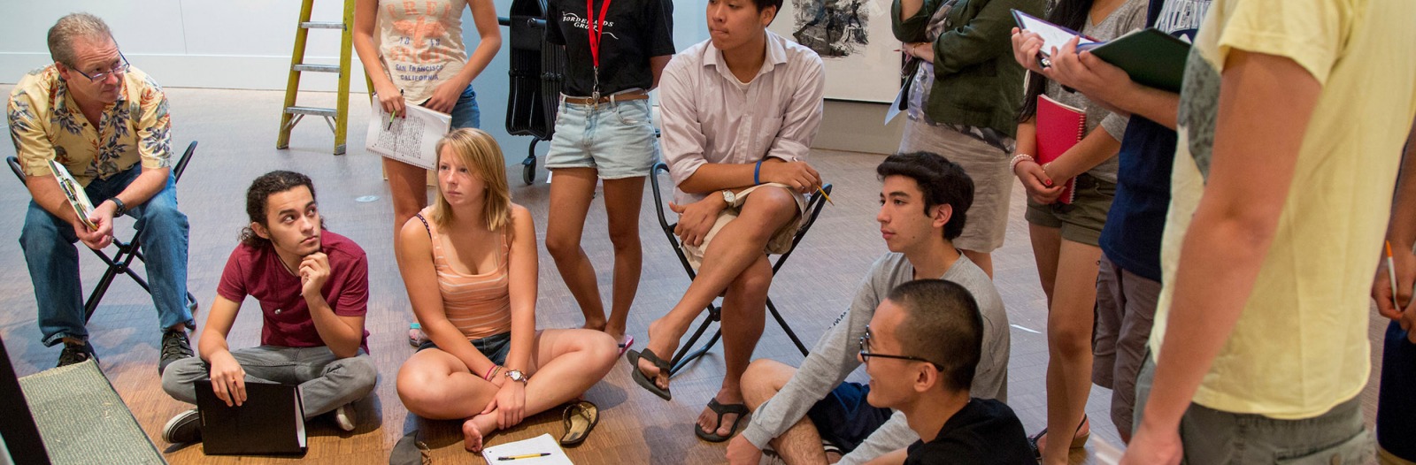 Students gather in Faulconer Gallery for a tutorial discussion