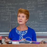 Leslie Delmenico at desk