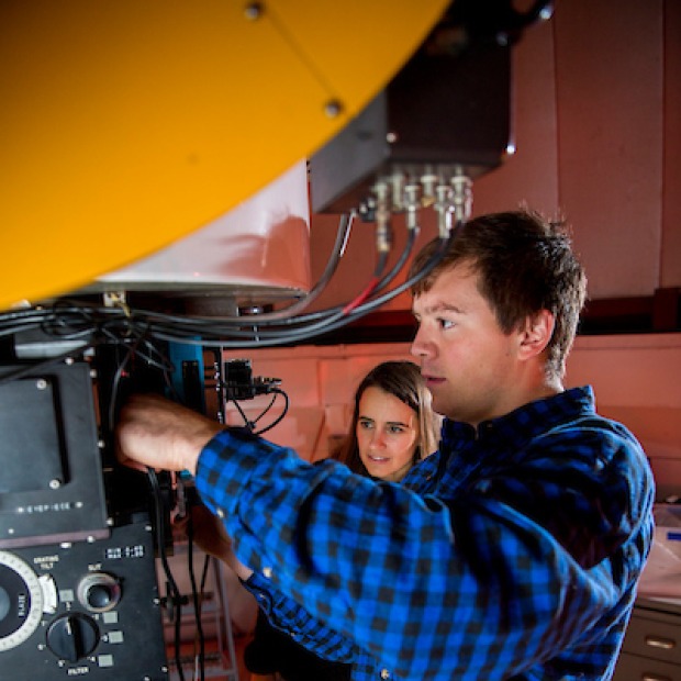 Student and professor in observatory