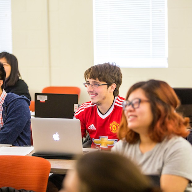 Students laugh in psychology class