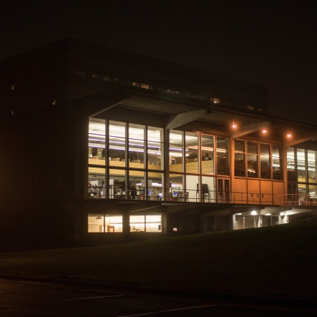 Burling Library at night, windows lit