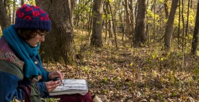 Students in Lee Running, Associate Professor of Art, drawing class use observational drawing techniques during a trip to the Conard Evironmental Research Area
