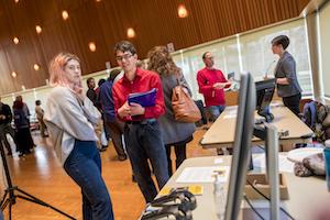 Students exploring the various displays at the Digital Liberal Arts Fair