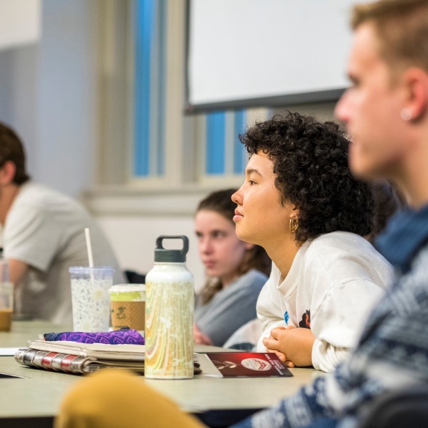 students listening in a classroom
