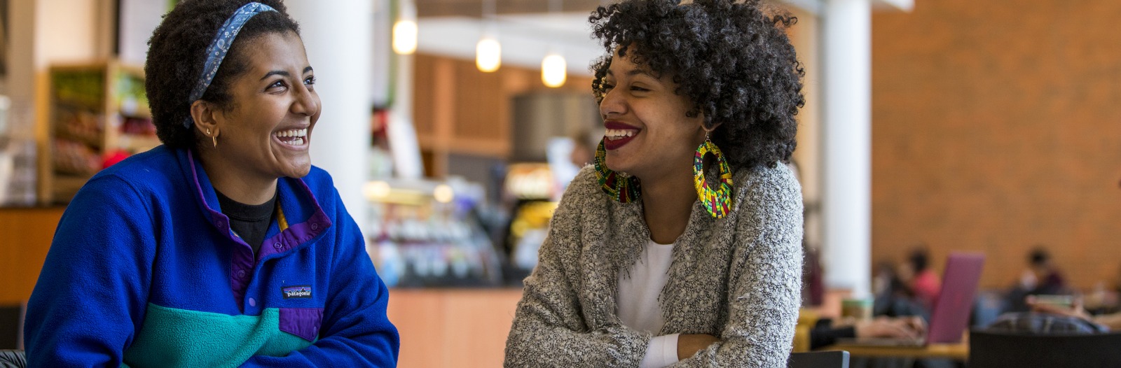 Lana Katai ’12, talks with friends in the Spencer Grill