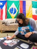 Student sitting in one of the multicultural center rooms.