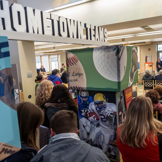 Raynard S. Kington speaks to crowd at Hometown Teams exhibit