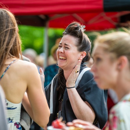 laughing person at outdoor reception