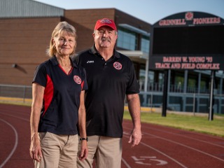 Will and Evelyn Freeman on the outdoor track