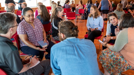 Faculty, staff, students in discussion during Restorative Practices session