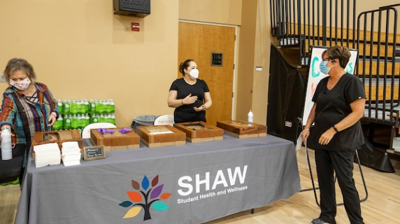 SHAW table at covid vaccine clinic