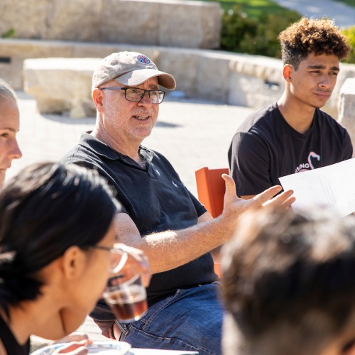 Professor Todd Armstrong and class outdoors