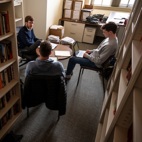 Professor and two students 