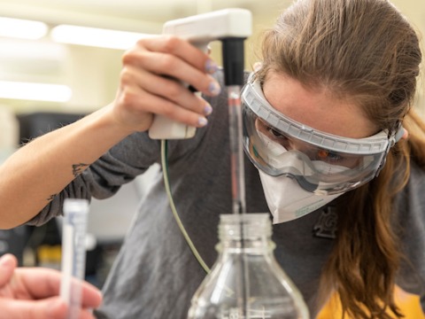 Student works in the biological chemistry lab