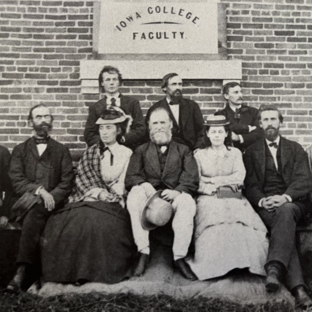 George Magoun in the center of a group of faculty 