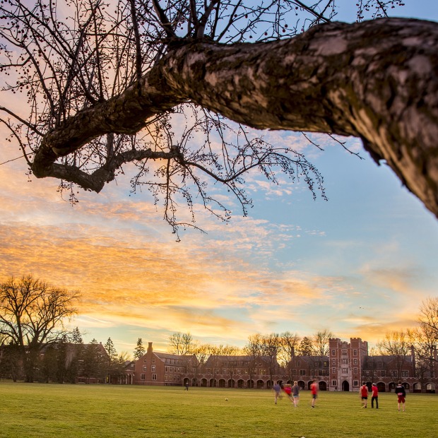 a view of North Campus at sunset with blue sky and orange and yellow clouds