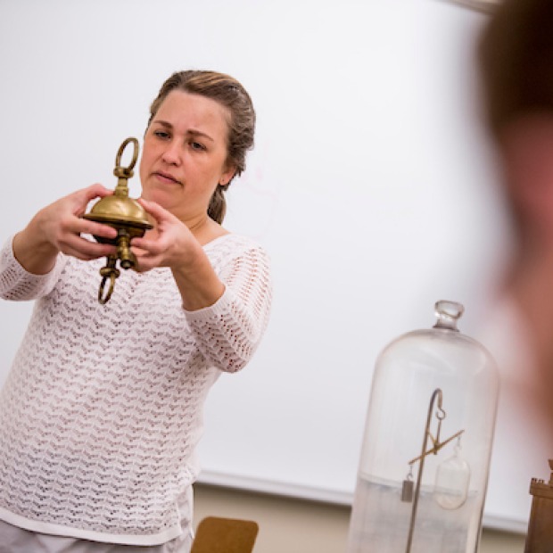 Professor Nyden demonstrates early scientific instruments