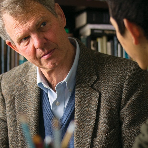 Professor listening to student 