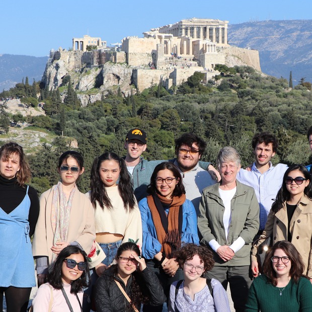 Students and Professor Monessa Cummins with the Athenian Acropolis behind them