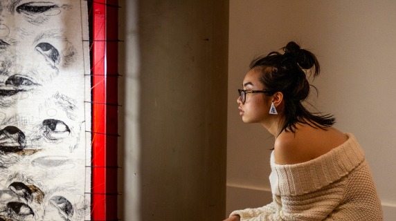 Student viewing art at museum