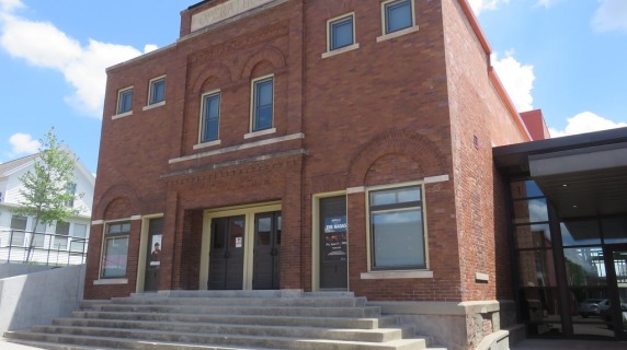 Brooklyn Opera House, two story brick building with steps leading up to doors