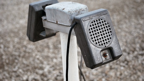 Car speakers at drive-in movie theater