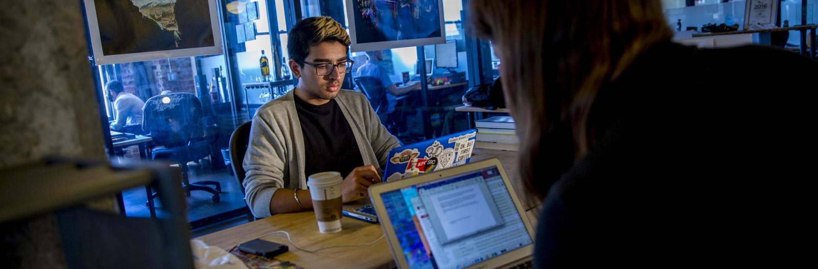 Student working on computer at internship