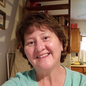 a picture of carlie in her kitchen at home