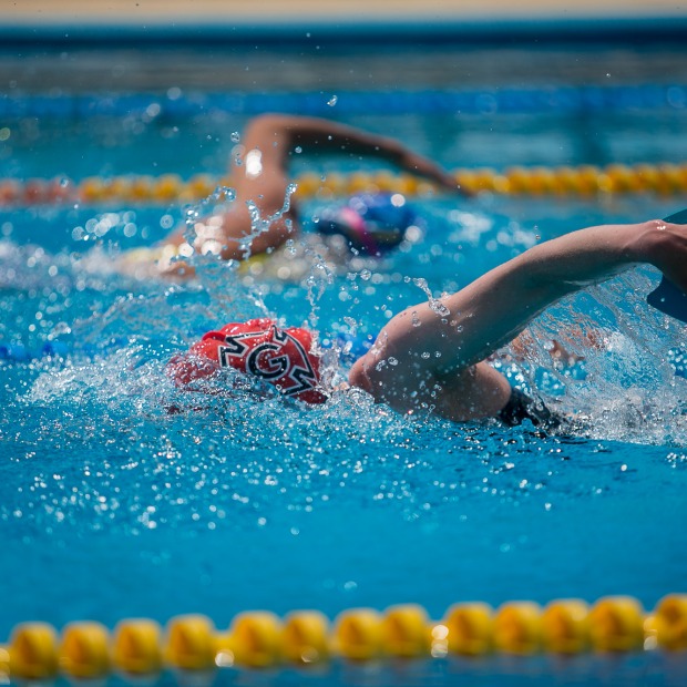 swimmer wearing Honor G swim cap