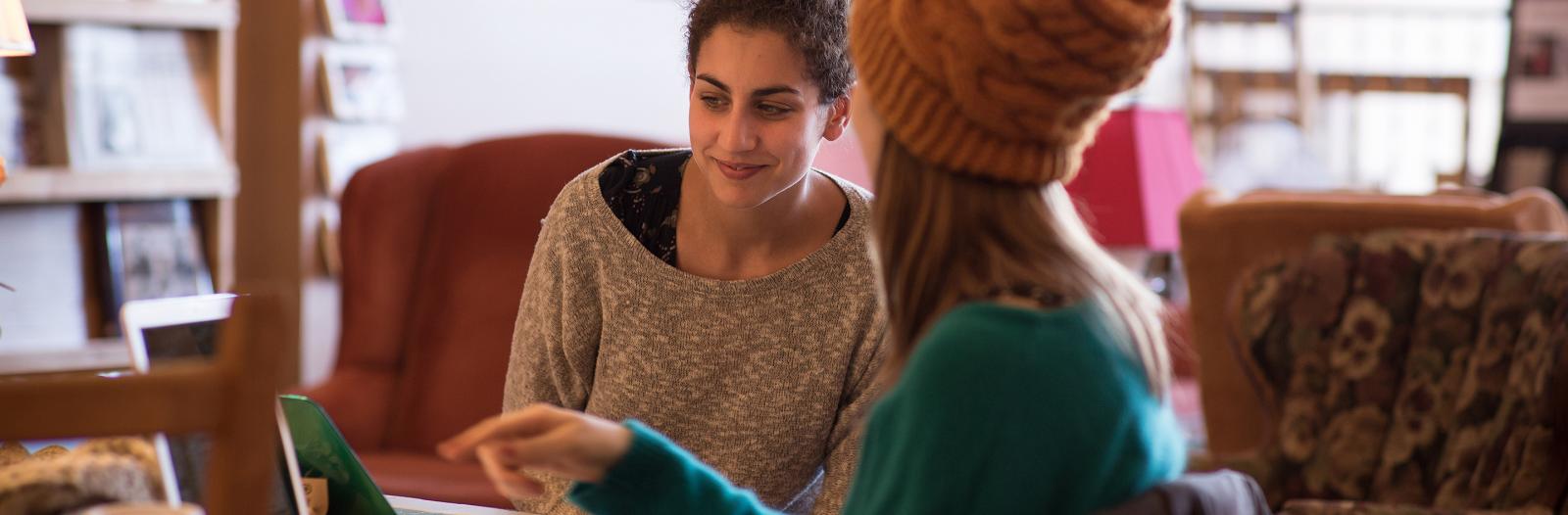 Students enjoy some quiet down time in Saints Rest coffee shop downtown only a couple blocks away from campus