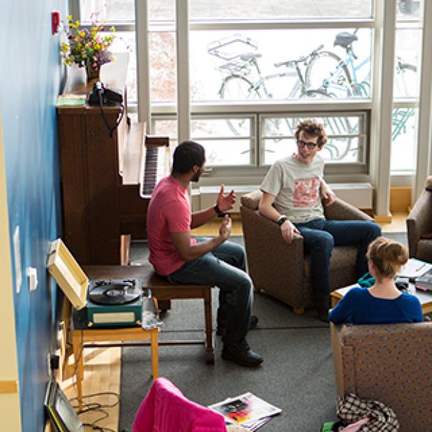 Students chat in dorm lobby