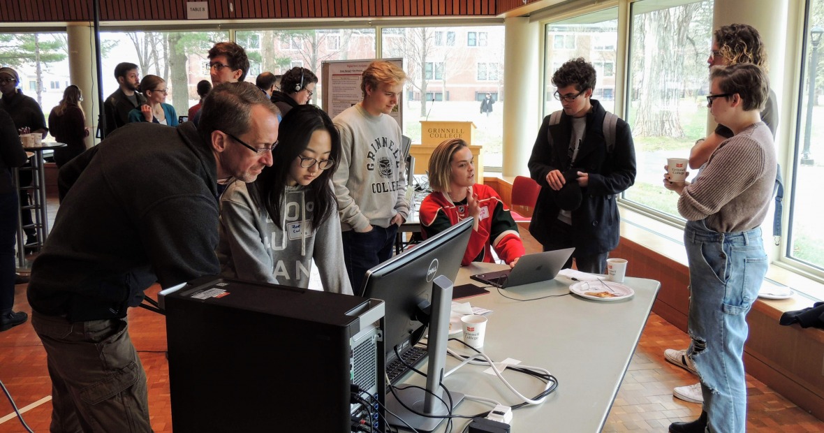 Students at the exhibit of the virtual reality project, "The Viking Meadhall"