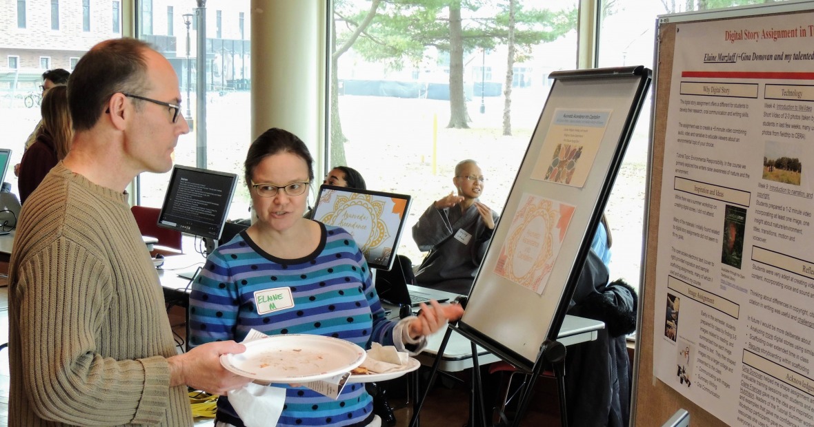 Professor Marzluff explains her digital storytelling assignment to Dean Levandowski.