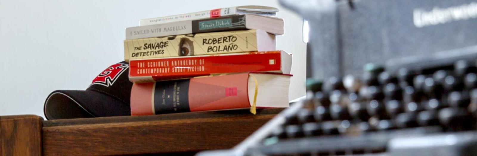 typewriter and books