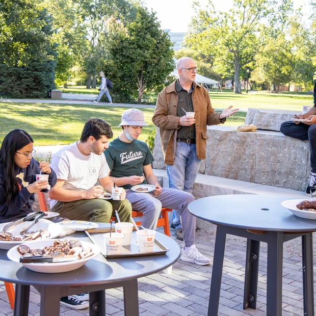 An outdoor class meeting for the course "Comrades in the Kitchen"