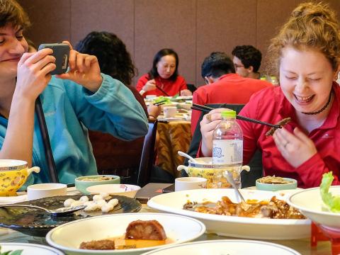 Students enjoy food in China