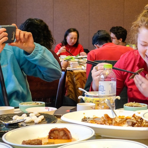 Students enjoy food in China