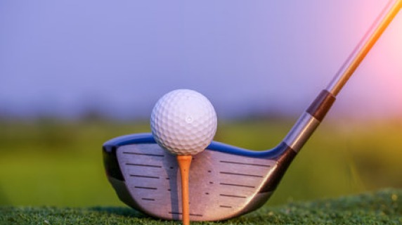 golf club with ball on tee