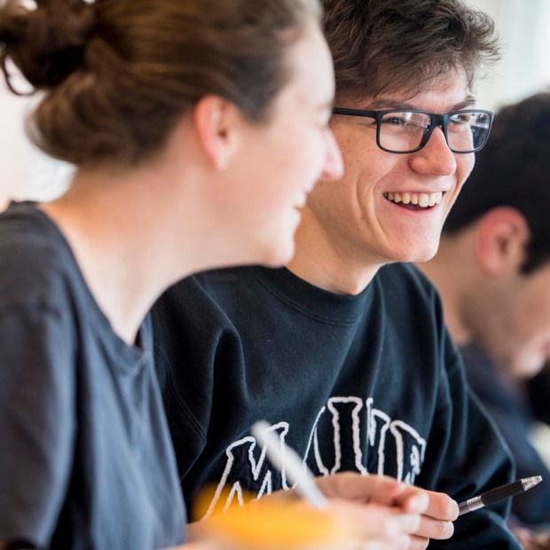 two students laughing