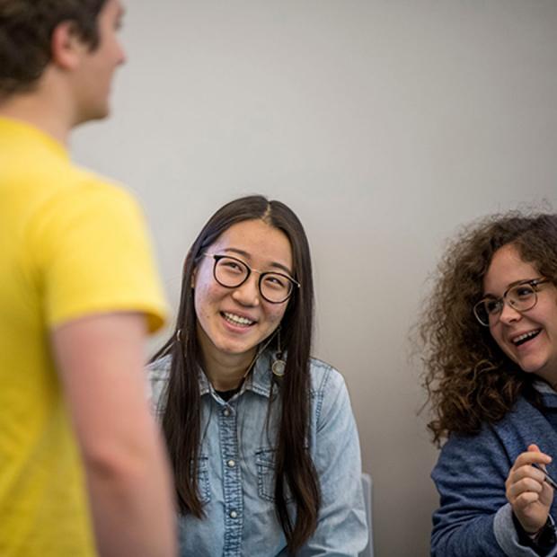 Three students talking