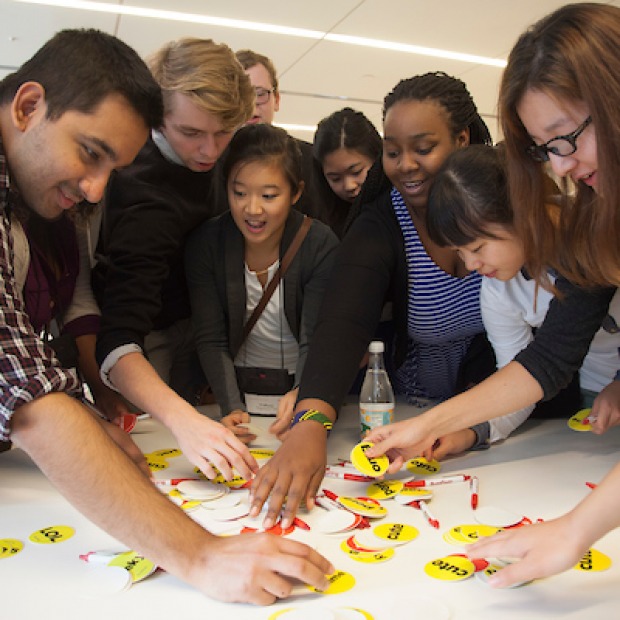 Students reach for "reaction stickers" at Buzzfeed HQ