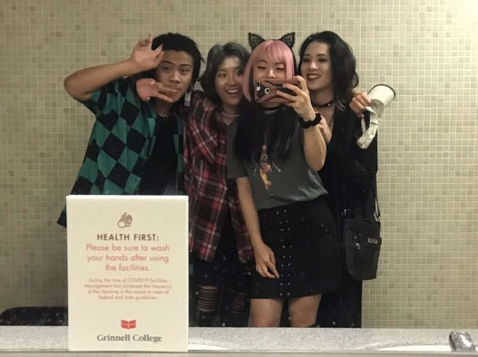 Mia and her friends are dressed up for Halloween