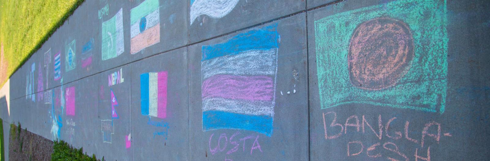 chalk flags on sidewalk