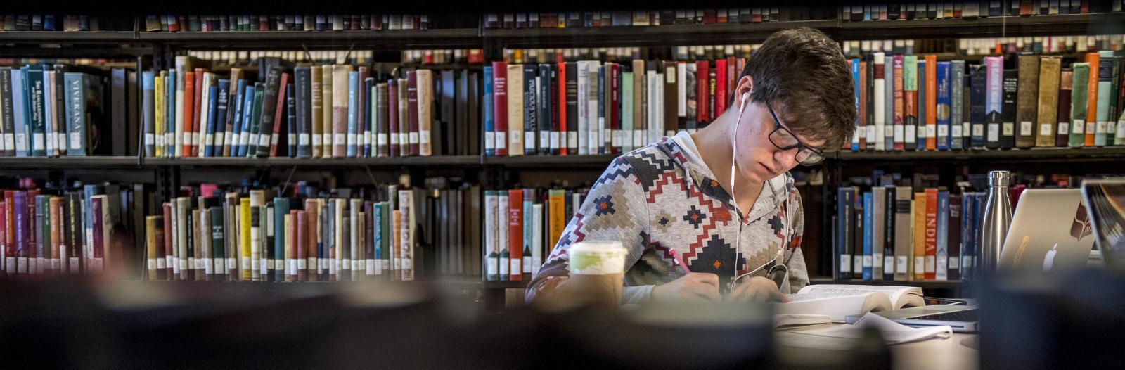 Student studying in Burling Library