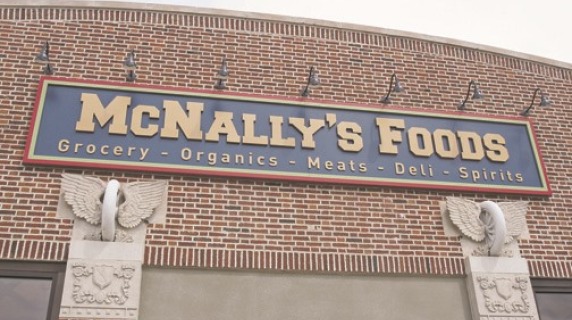 McNally's Foods sign on building