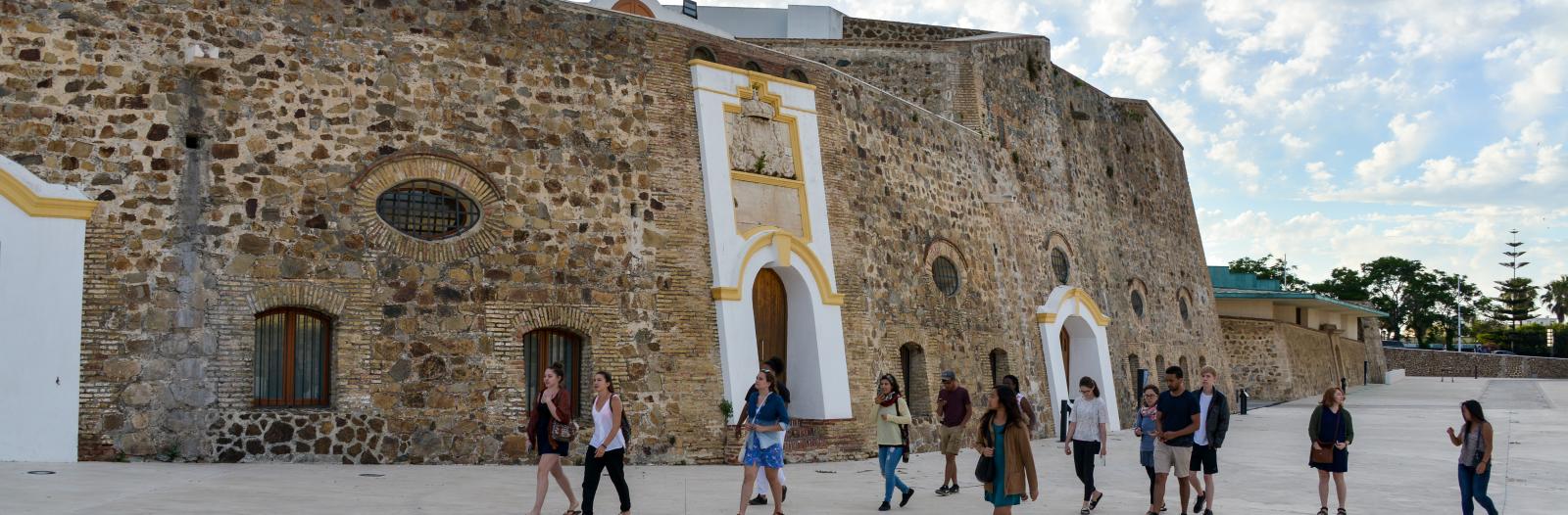 Group of students on a short term program walking in Ceuta, Spain 