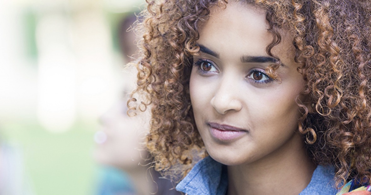 A close up of an attentive young person 