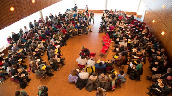 overhead view of crowd at town hall meeting