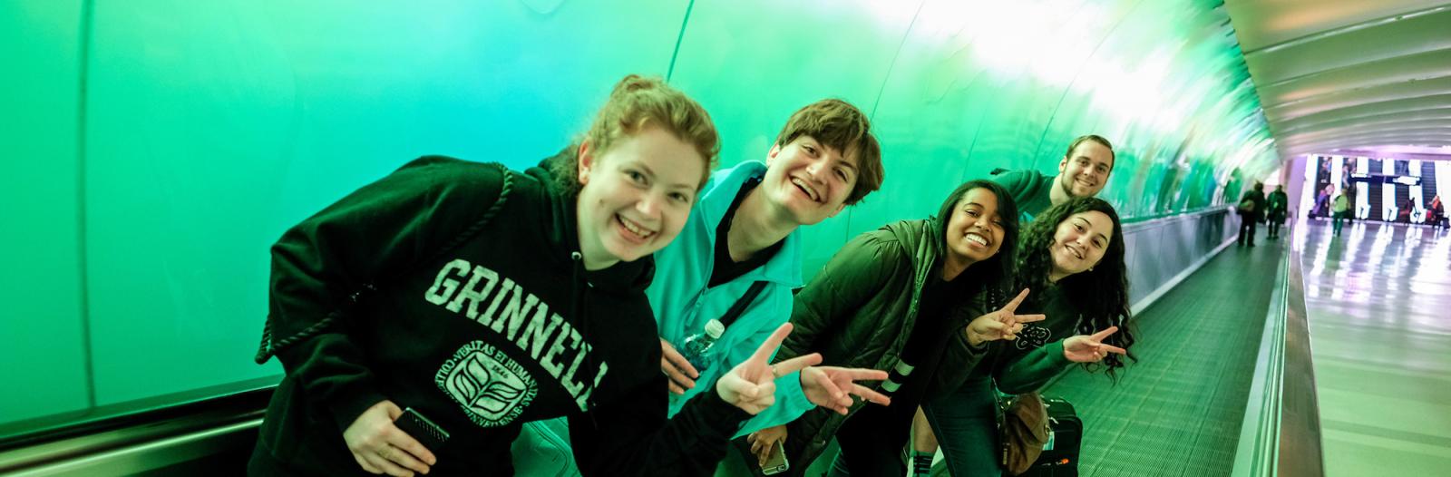 Students on people mover at Detroit airport