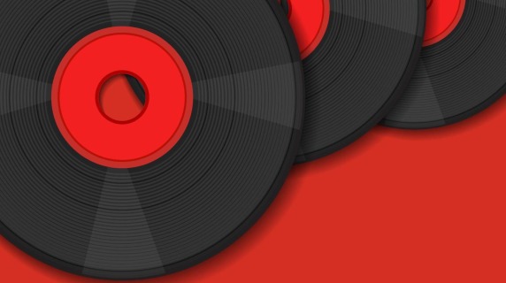 vinyl records on red background